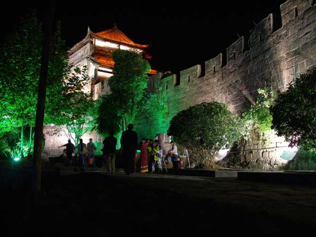 City wall lit by night