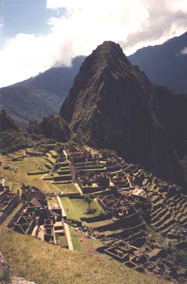 Huayna Picchu overlooking the ruins of Machu Picchu